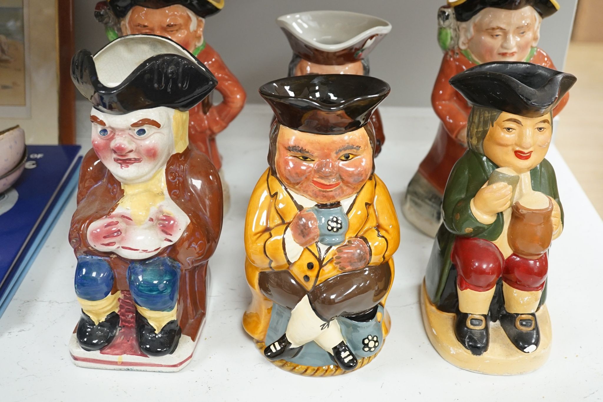 Ten various pottery Toby jugs, including 3 musical, tallest 26.5cm